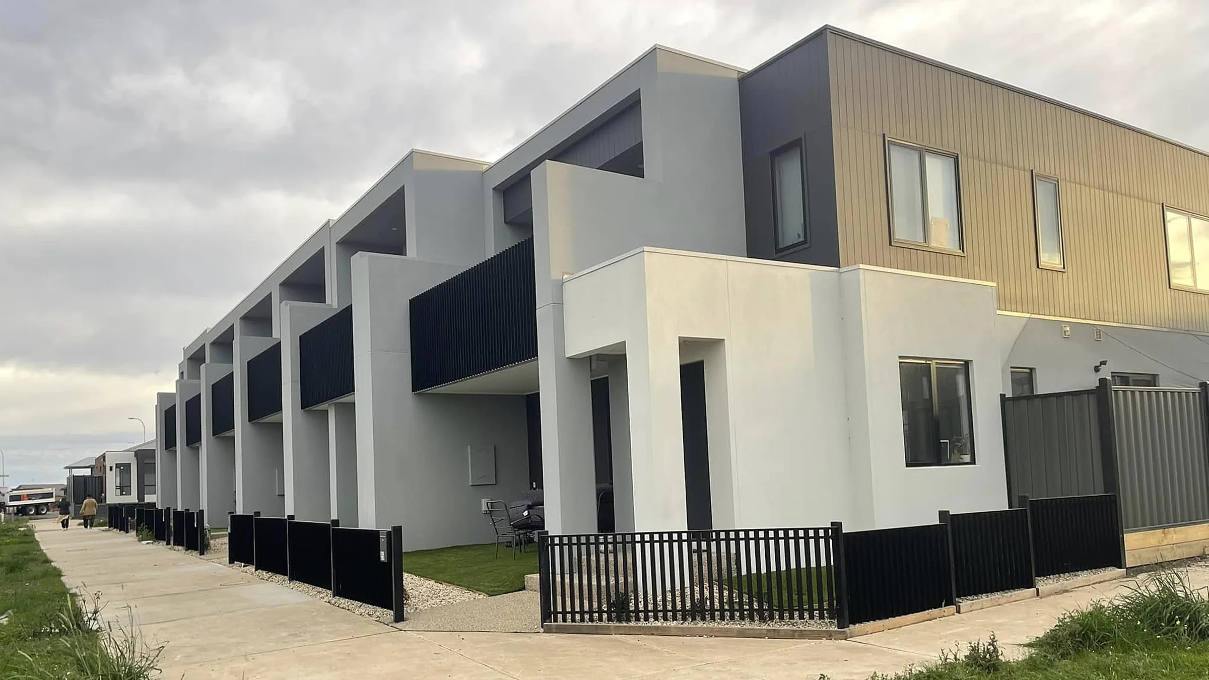 Rendered townhouse development in Donnybrook with white and grey render